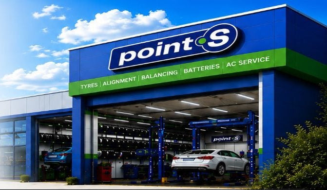 Advertisement for POINT S Tyres & Auto Service franchise with store exterior and contact information.